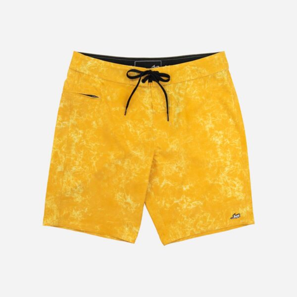 Bright yellow board shorts on white background