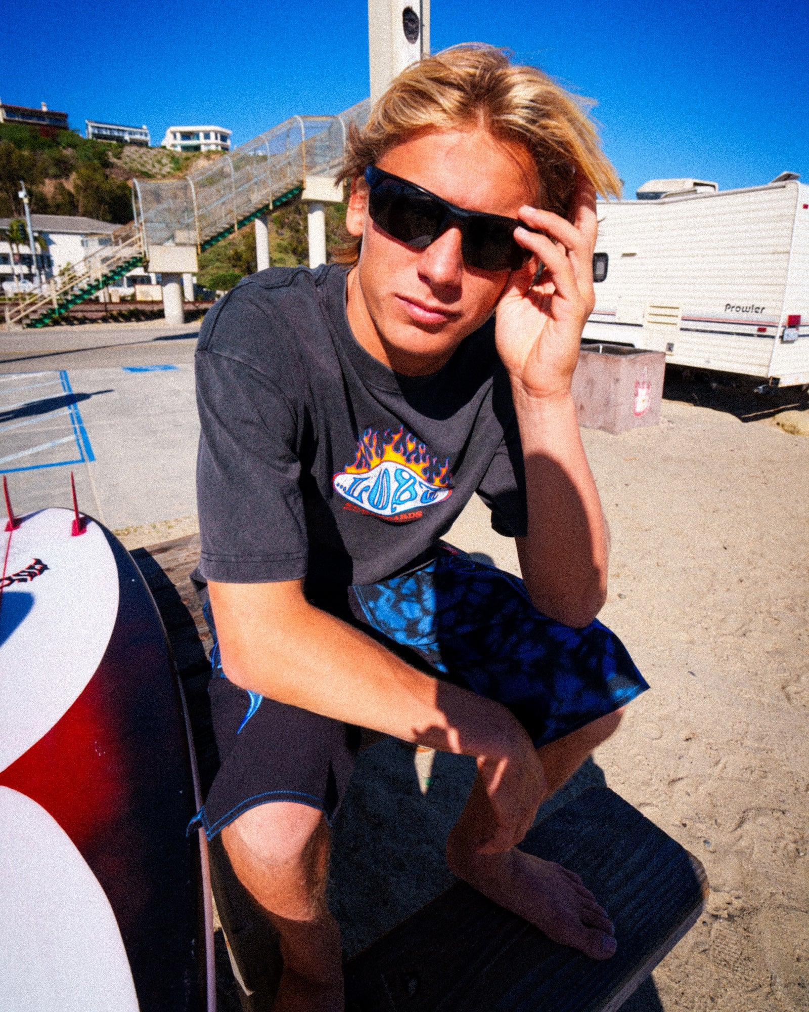 Young man relaxing by the beach.