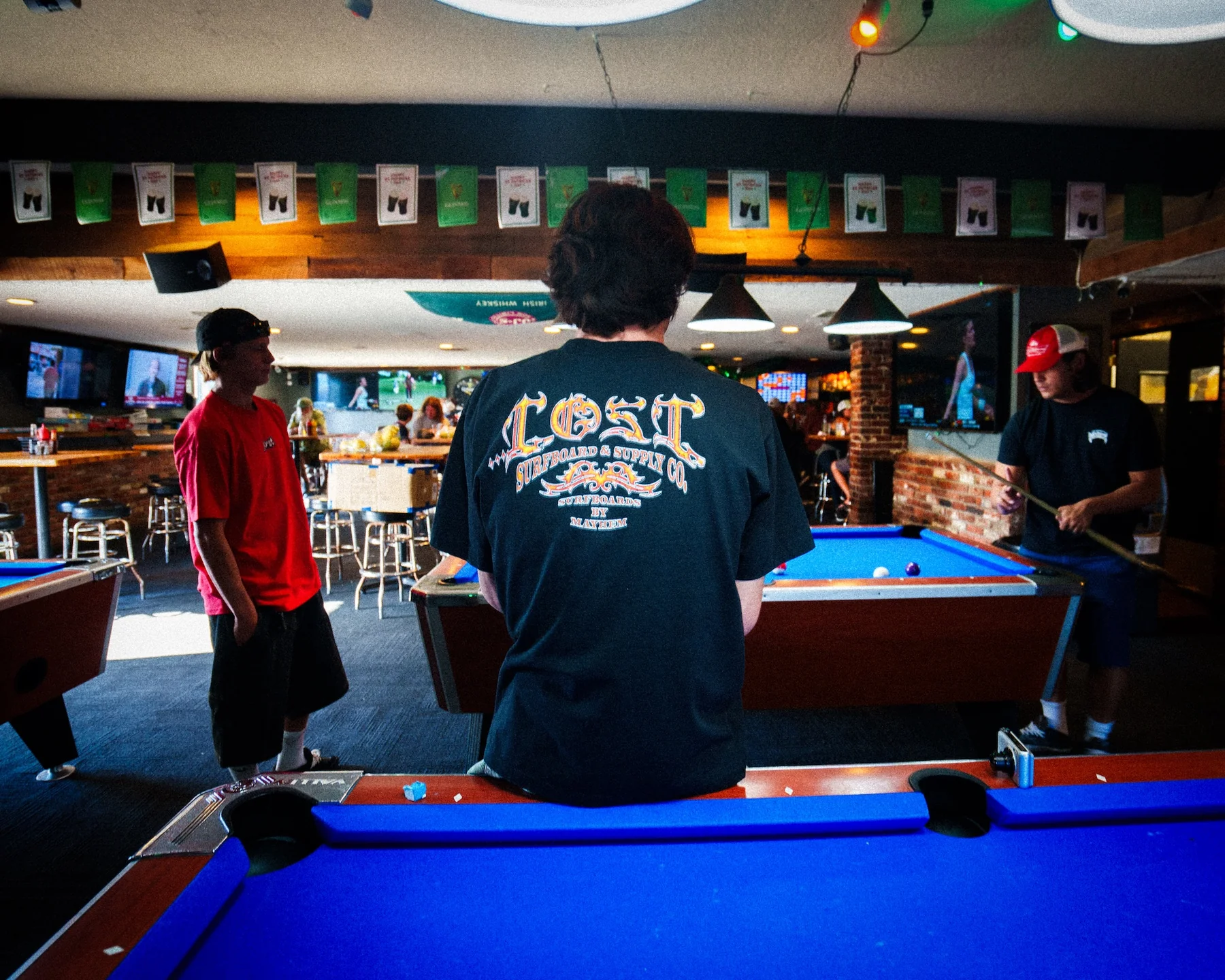 Friends enjoying a game of billiards