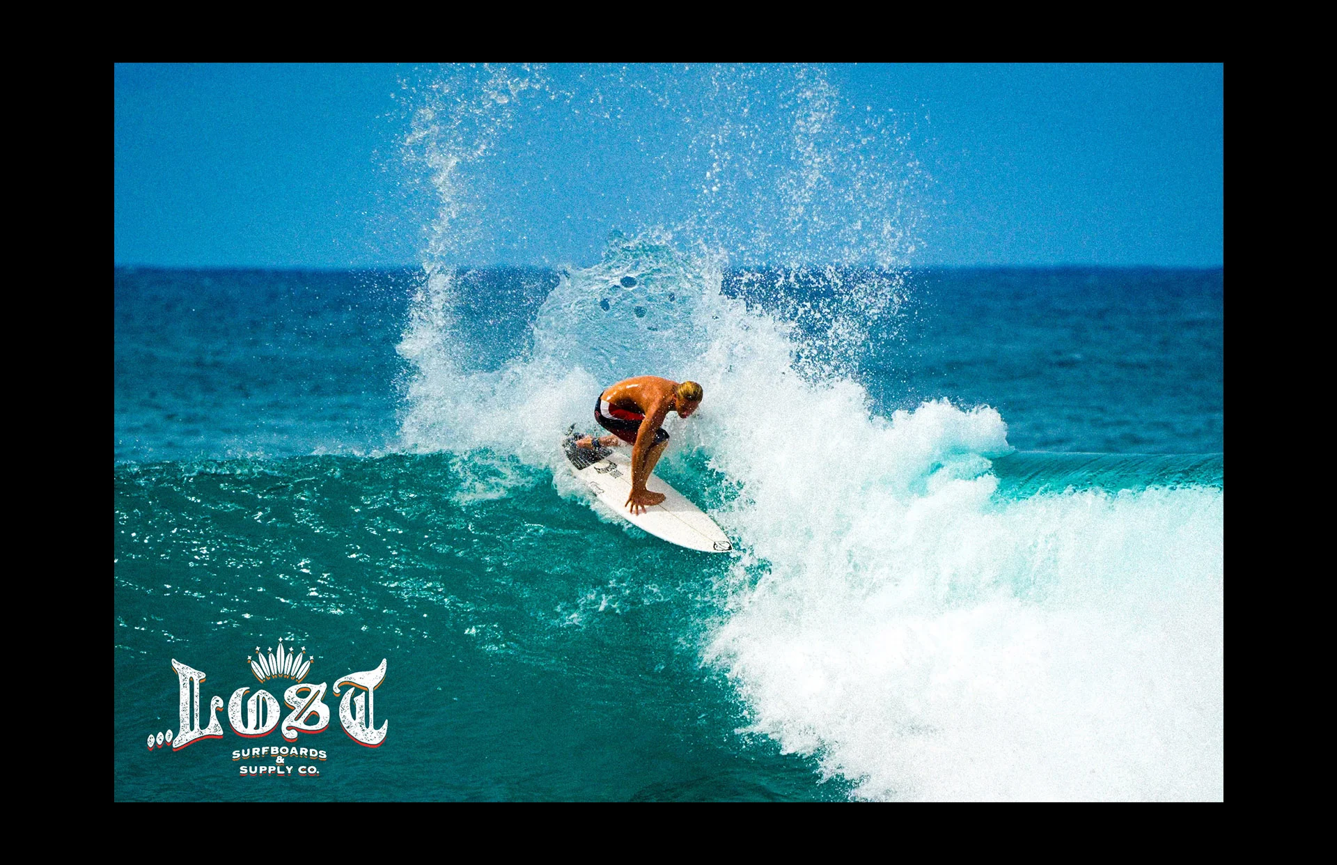 Surfing in blue ocean